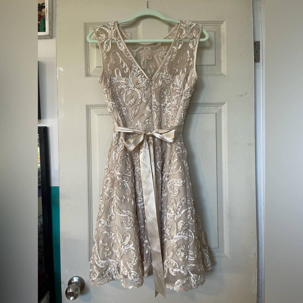 Elegant Cream Lace A-Line Dress with Satin Belt - Picture 2 of 3